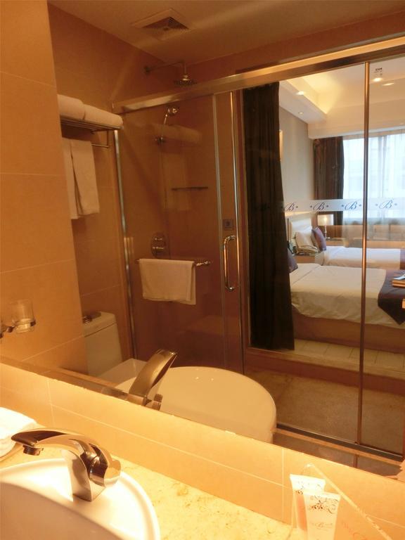 Guangzhou Bauhinia Hotel Værelse billede
