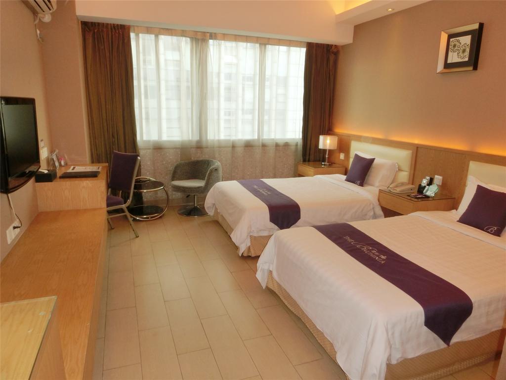 Guangzhou Bauhinia Hotel Værelse billede