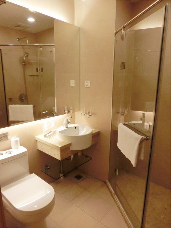 Guangzhou Bauhinia Hotel Værelse billede